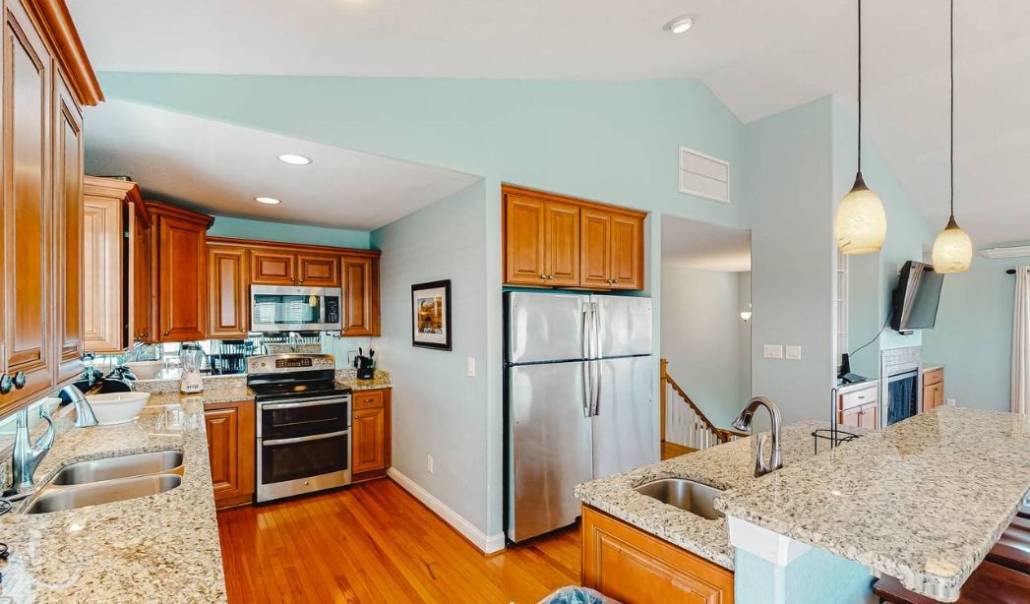 Irish Blessings custom kitchen with wooden cabinetry, intricate moldings and aesthetic design