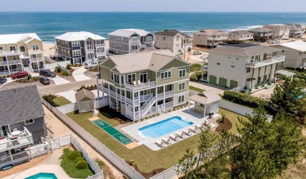 Aerial view of project Amazing Grace built by RBC Homes with large backyard and elegant outdoor pool in Virginia Beach