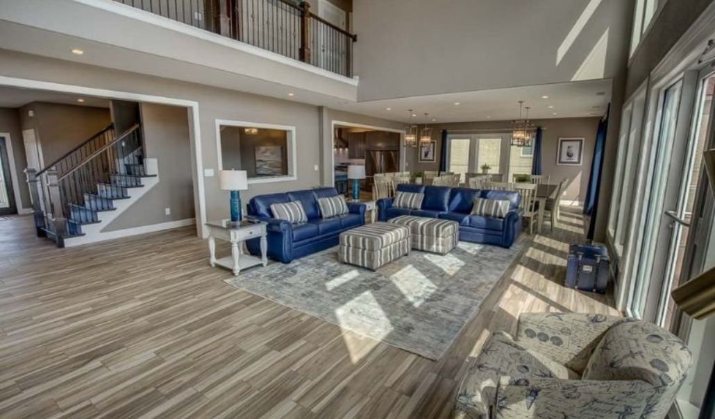 Elegant living area with large space and aesthetic interior design built by RBC Homes for their client living in Virginia Beach