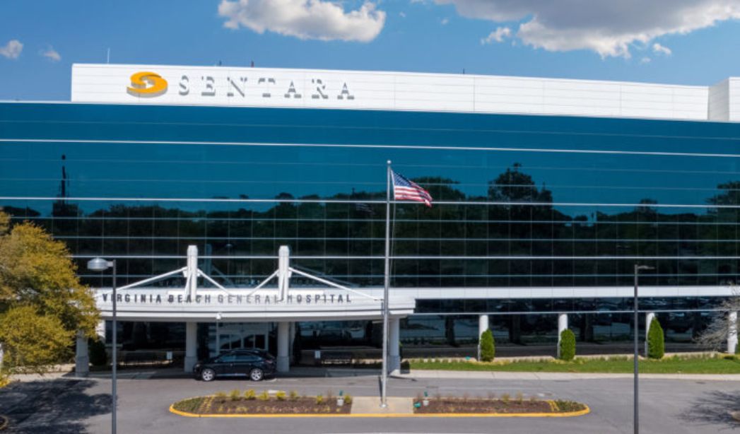 Front entrance of the Amera building at Sentara Virginia Beach General Hospital, showcasing modern architecture and welcoming design.