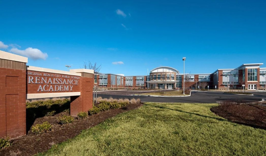 Exterior view of a Renaissance high school in Virginia Beach, highlighting its modern architecture and students participating in classes.