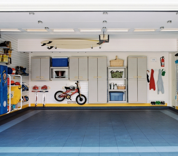 Interior view of a garage with blue walls and flooring, designed for optimal functionality in Virginia Beach.