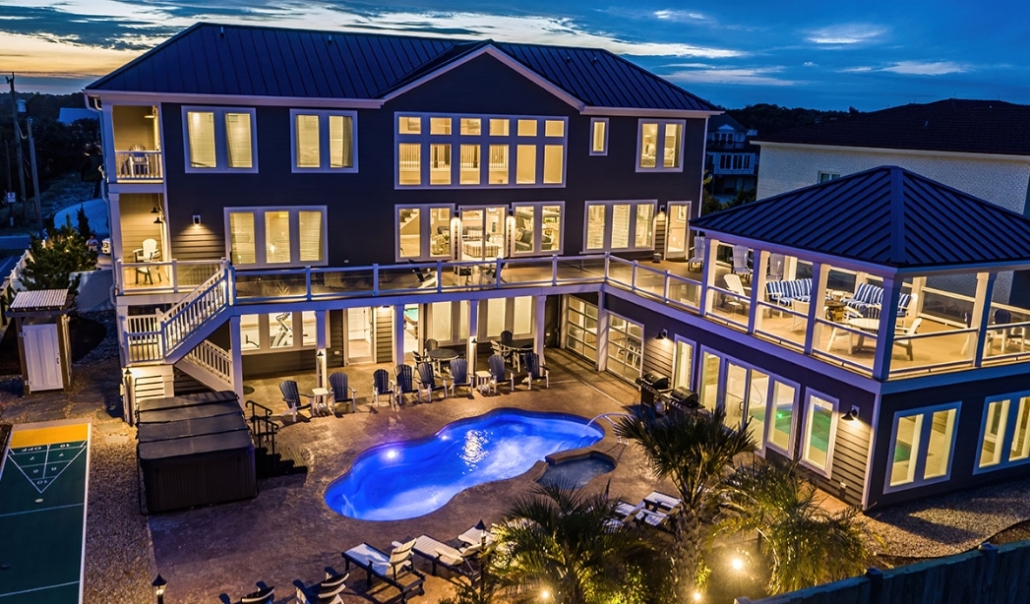 Spacious Virginia Beach home with a pool and deck, highlighting coastal design elements for home improvement.