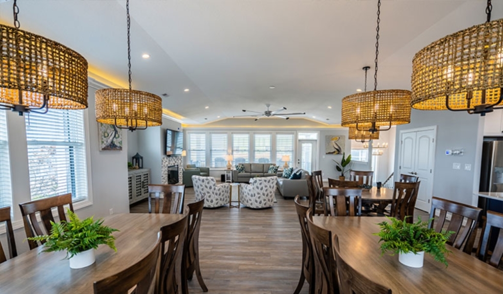 The dining room and kitchen flow into the living room, showcasing an open layout often over-designed in renovations.