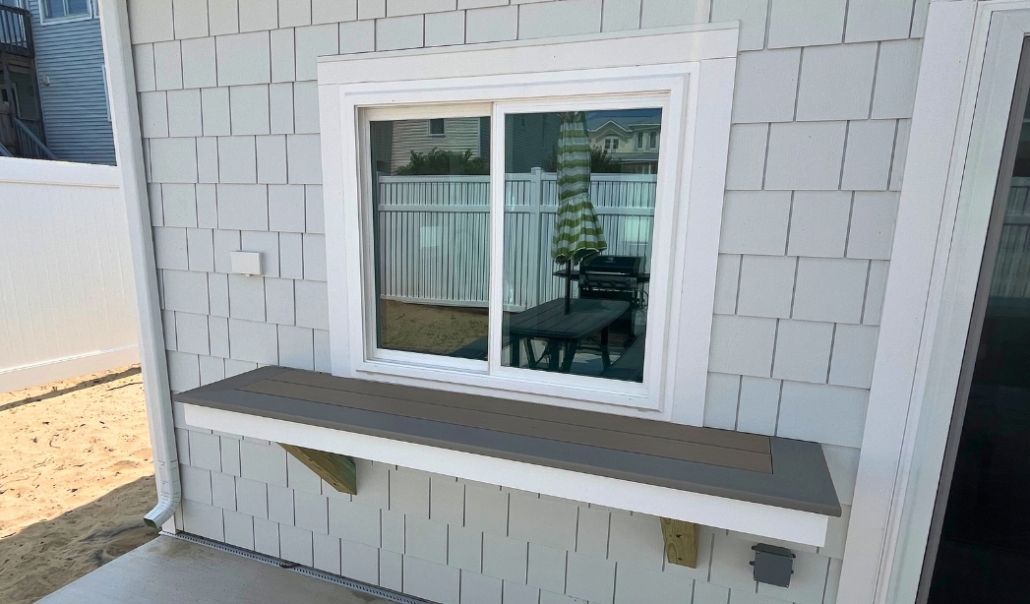 A house featuring a window, emphasizing the topic of when to replace windows and associated costs.