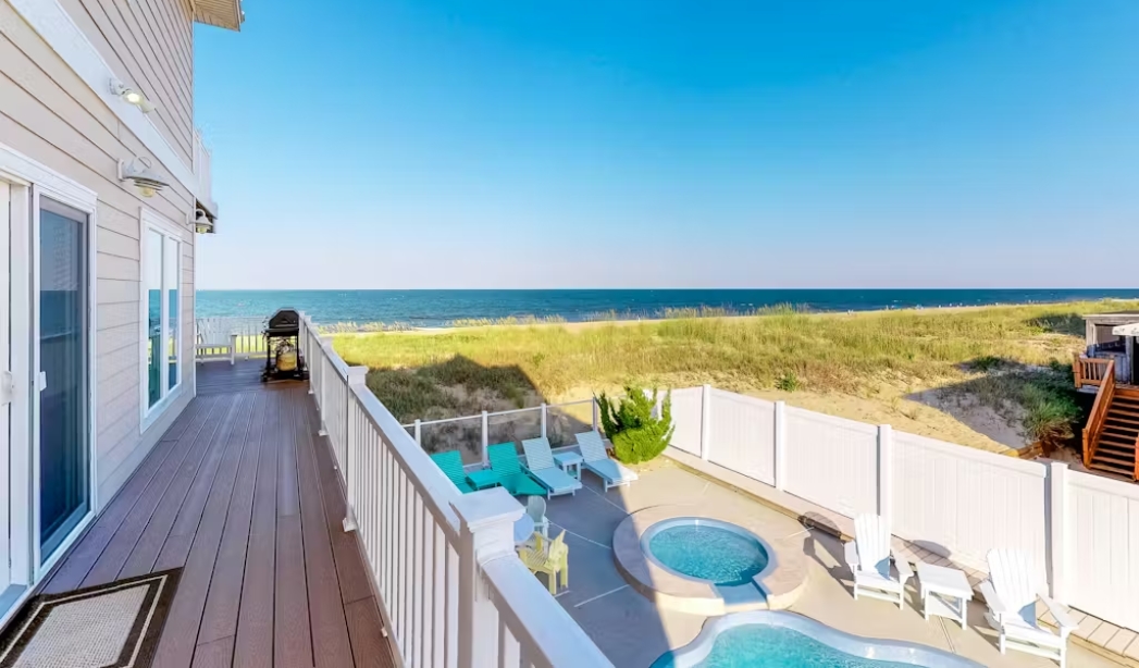 View of the ocean from a deck at the Atlantic Villa Fran-to-Sea, built by Lagomar Virginia Beach Home Builders.