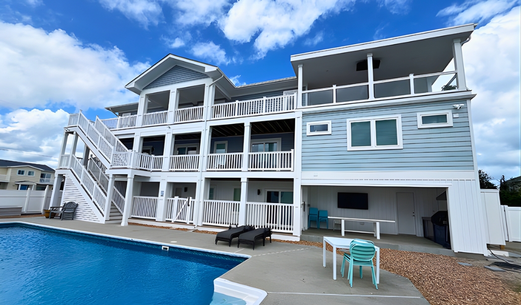 Spacious home with a pool and deck, created by Bluefish Remodel in North End Virginia Beach.