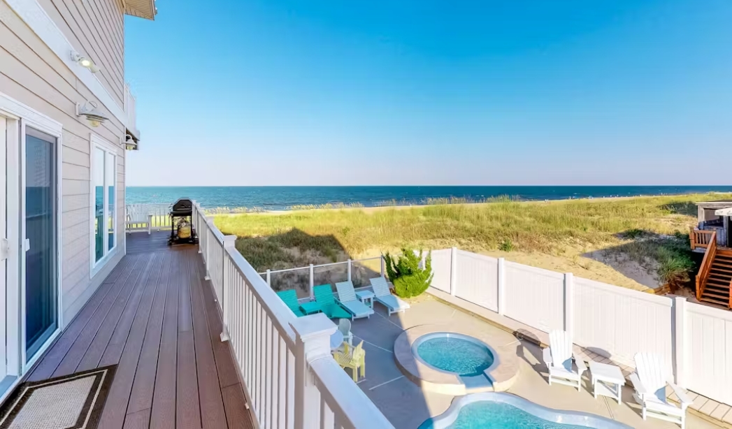 Ocean view from the deck of a house, showcasing the serene waters at Atlantic Villa Fran-to-Sea, Virginia Beach.