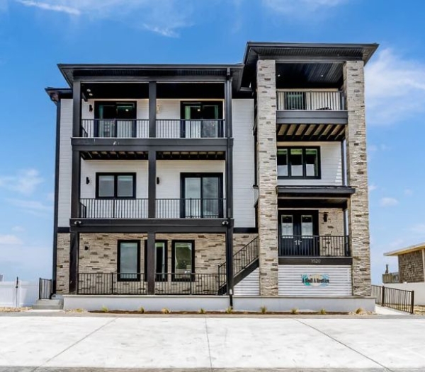 Two-story apartment building exterior, highlighting contemporary architecture in Virginia Beach.