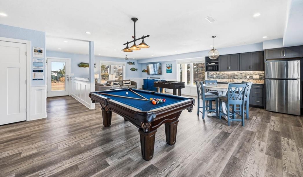 Retirement home addition with open entertainment space and first-floor suite