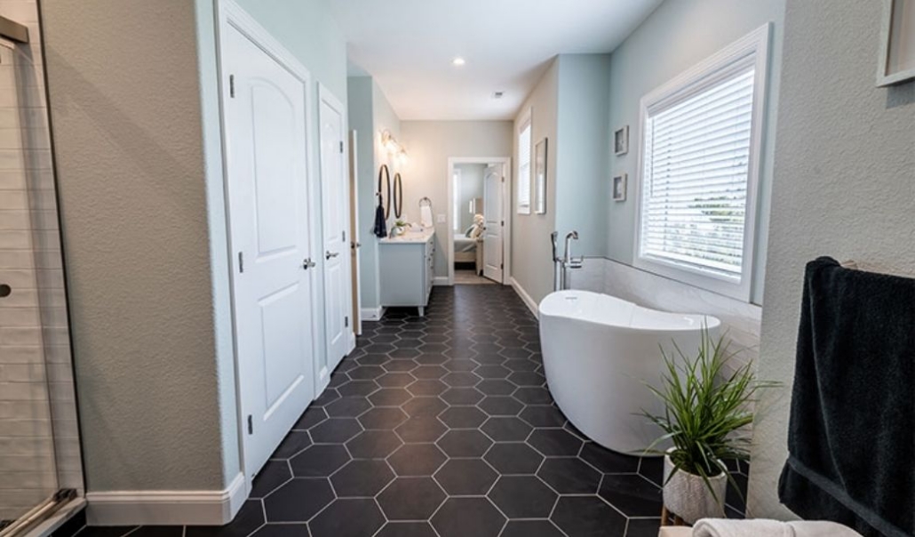 Modern custom bathroom with freestanding tub and spacious luxury layout