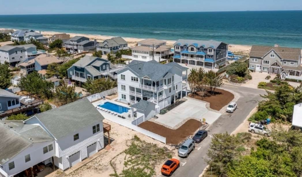 Coastal custom home design with oceanfront views and spacious outdoor living
