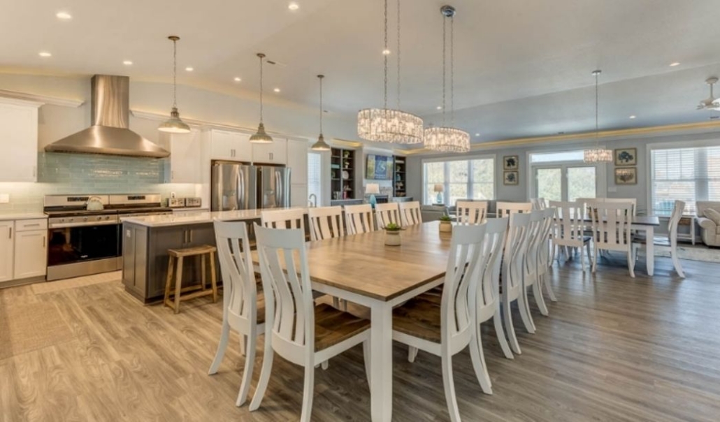 Open-concept custom home with large dining area and modern kitchen design