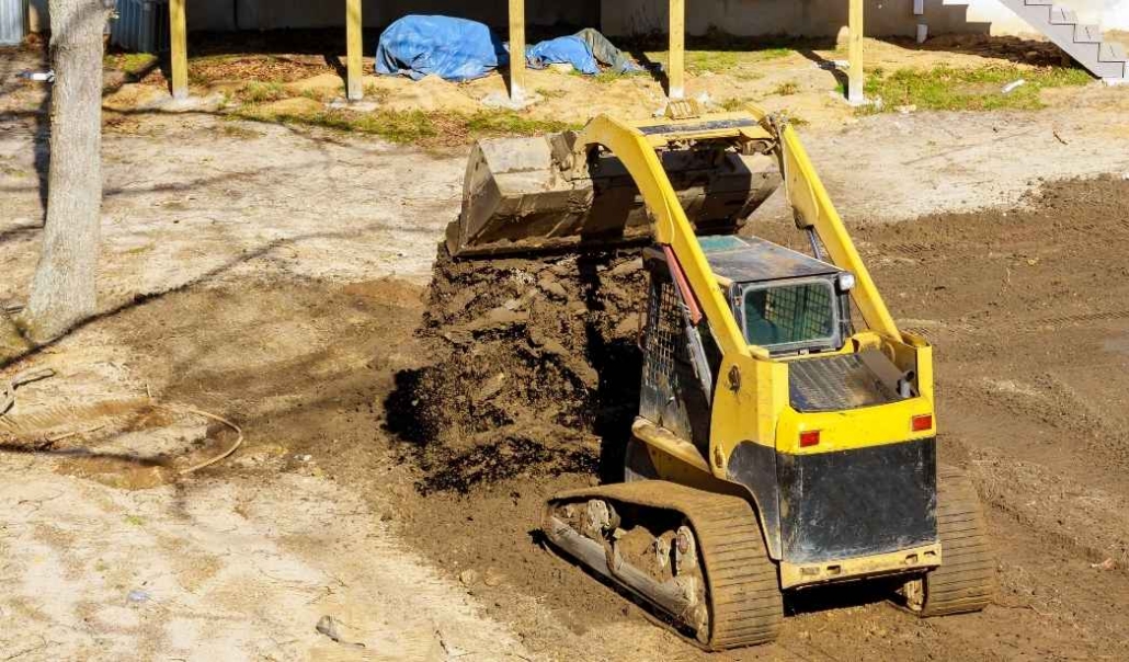 Site preparation for a custom Virginia Beach home with grading and foundation groundwork.