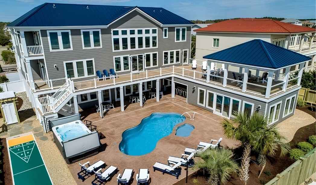 Remodeled Virginia Beach home with pool, decks, and expanded outdoor living space