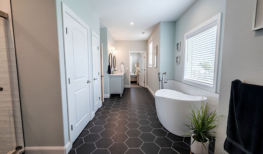 Bathroom remodel with quality tile and modern finishes showcasing the best ROI home additions in Virginia Beach