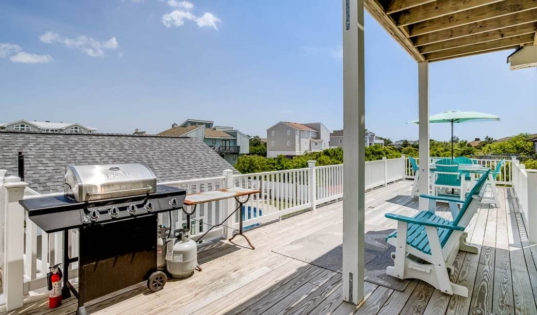 Wood deck addition with outdoor seating and grill at a Virginia Beach home